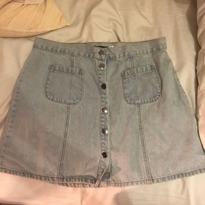 Urban Outfitters light denim snap front skirt